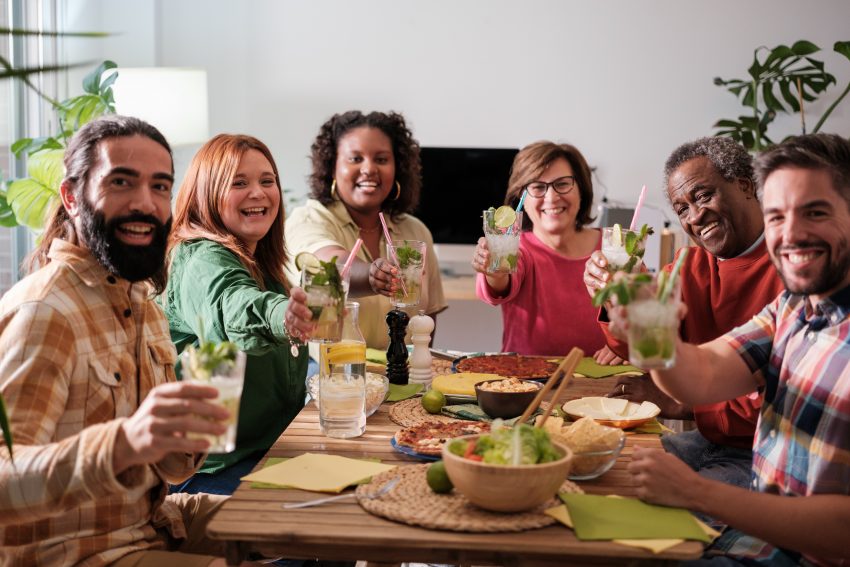 Group of people offering drinks