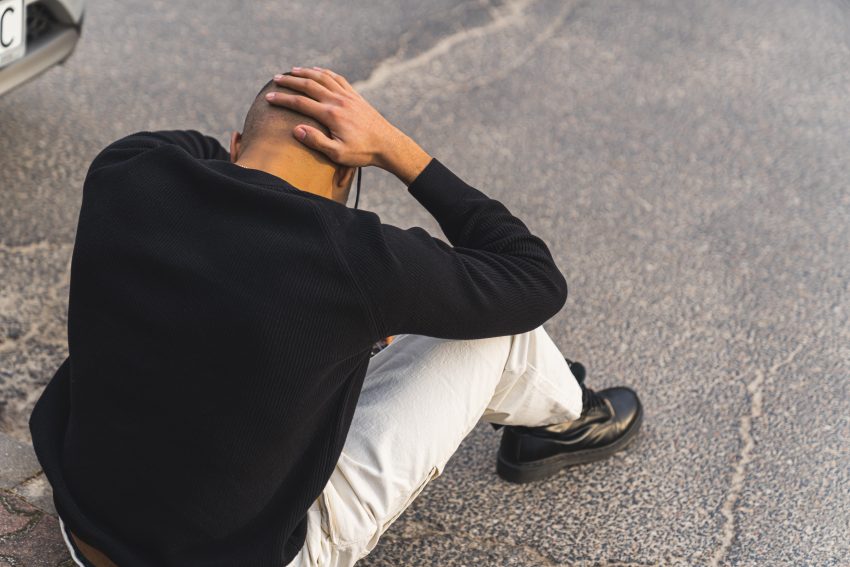 Man weighted by addiction struggle